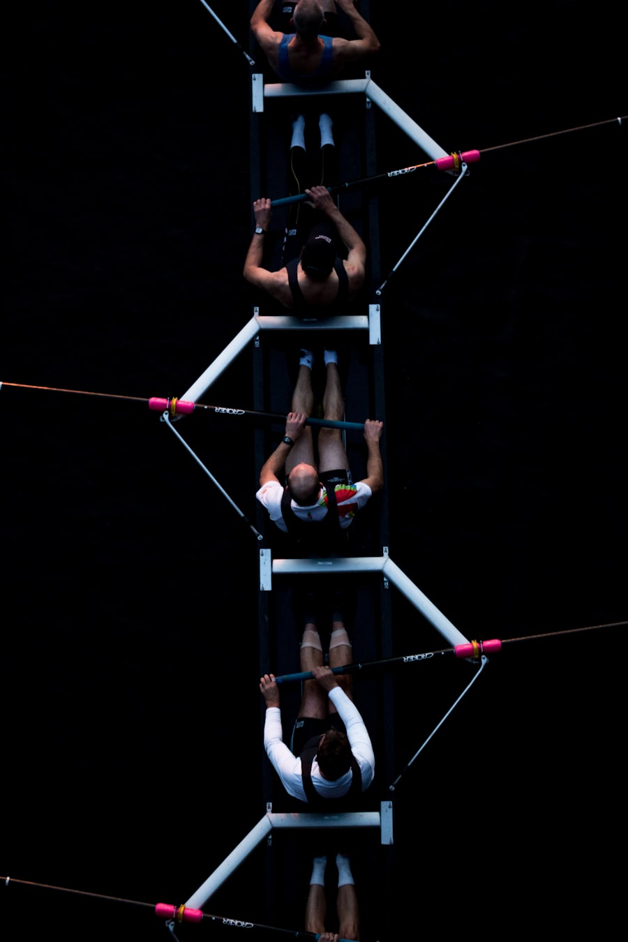 Team rowing together
